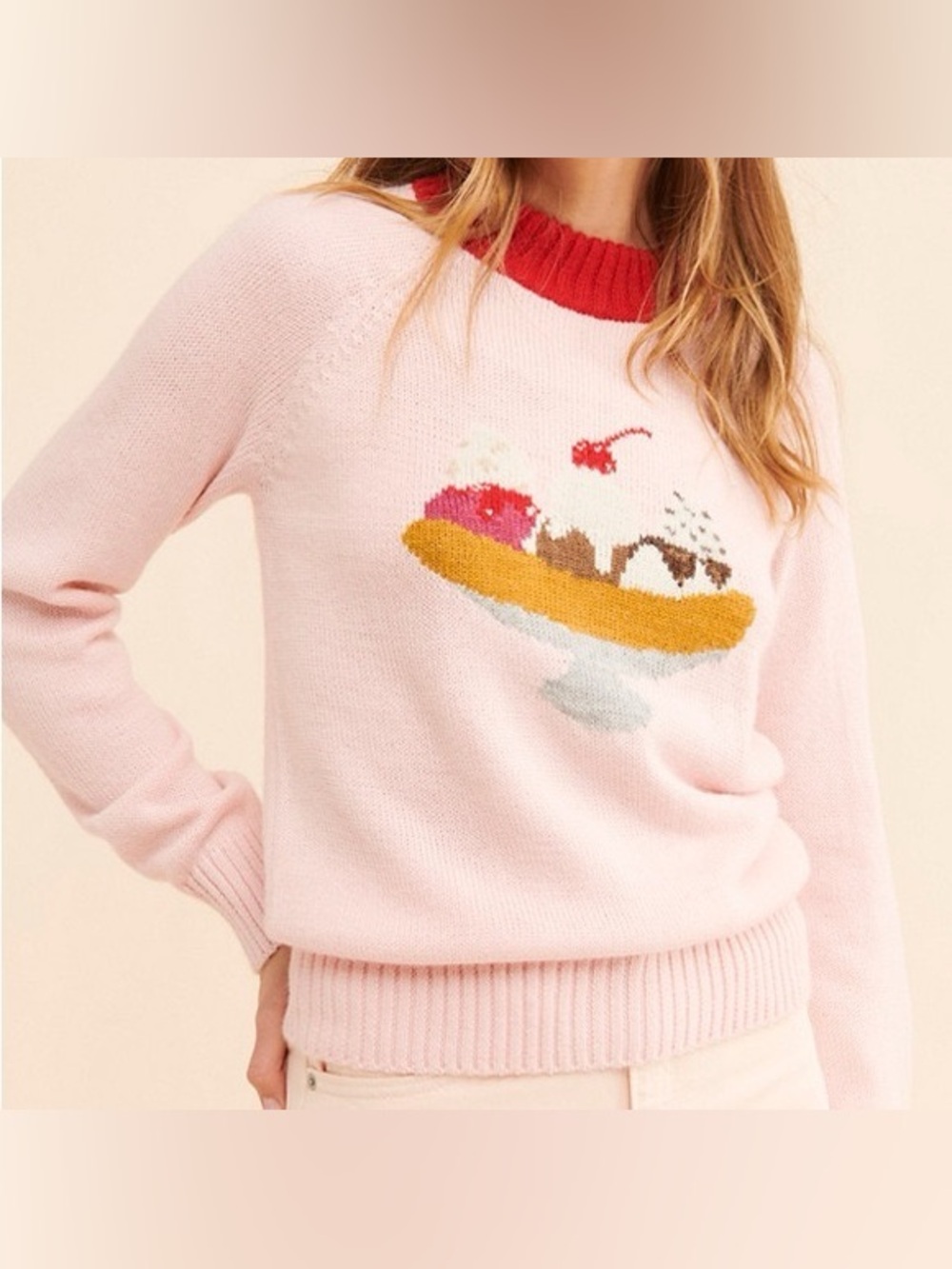 Rachel Antonoff "Banana Split" knit jumper in pale pink, featuring a playful